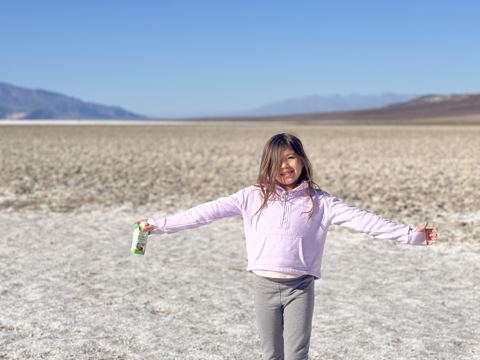 Arms out on the Badwater Basin salt flat, 282 feet below sea level