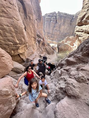 Scrambling down the boulders of Big Painted Canyon
